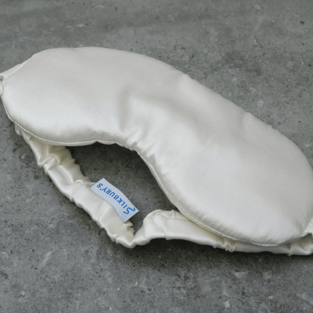 silk eye sleeping mask on a dark background