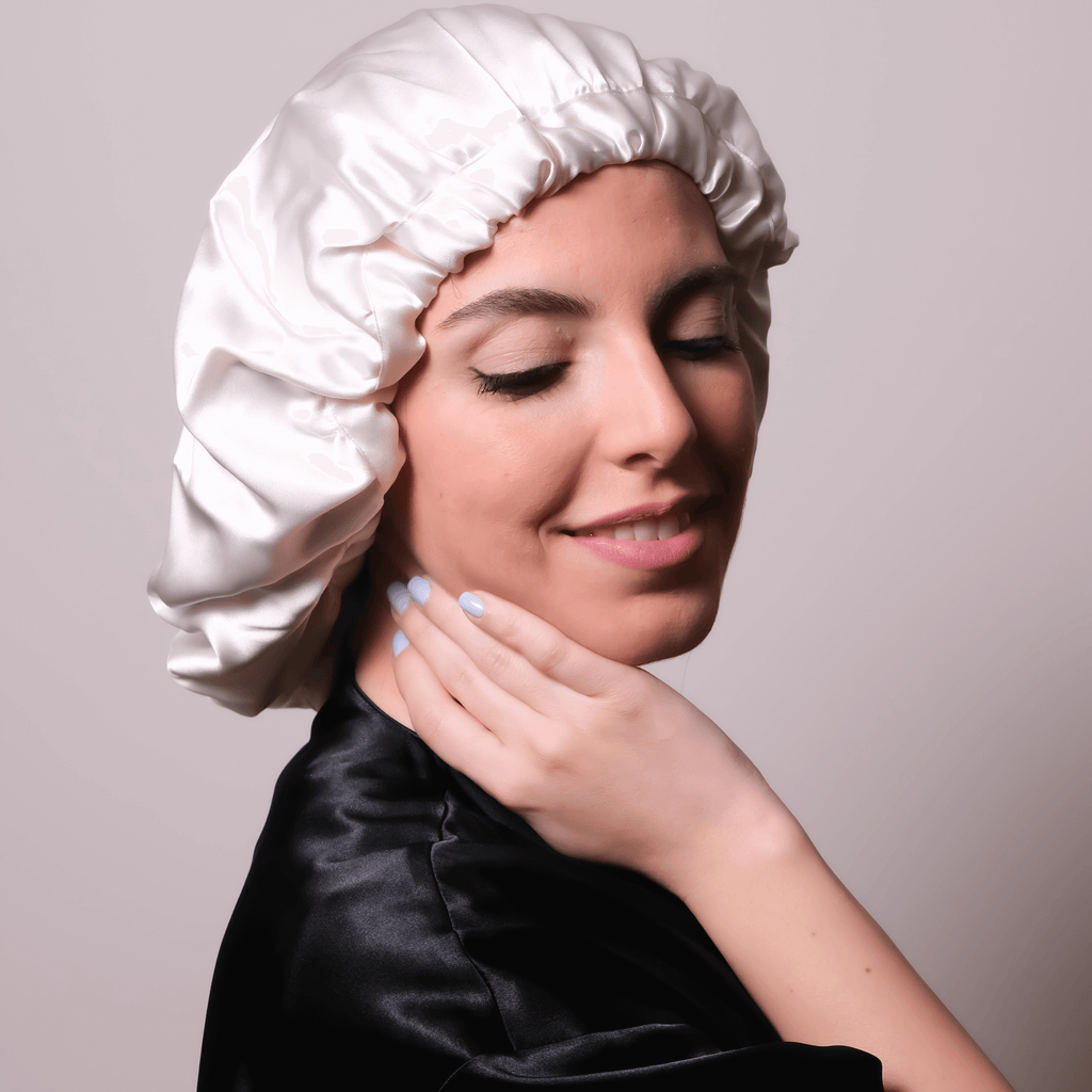 Profile of a Women wearing a silk hair bonnet or silk cap 