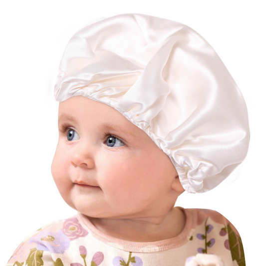 Baby wearing silk baby bonnet/cap