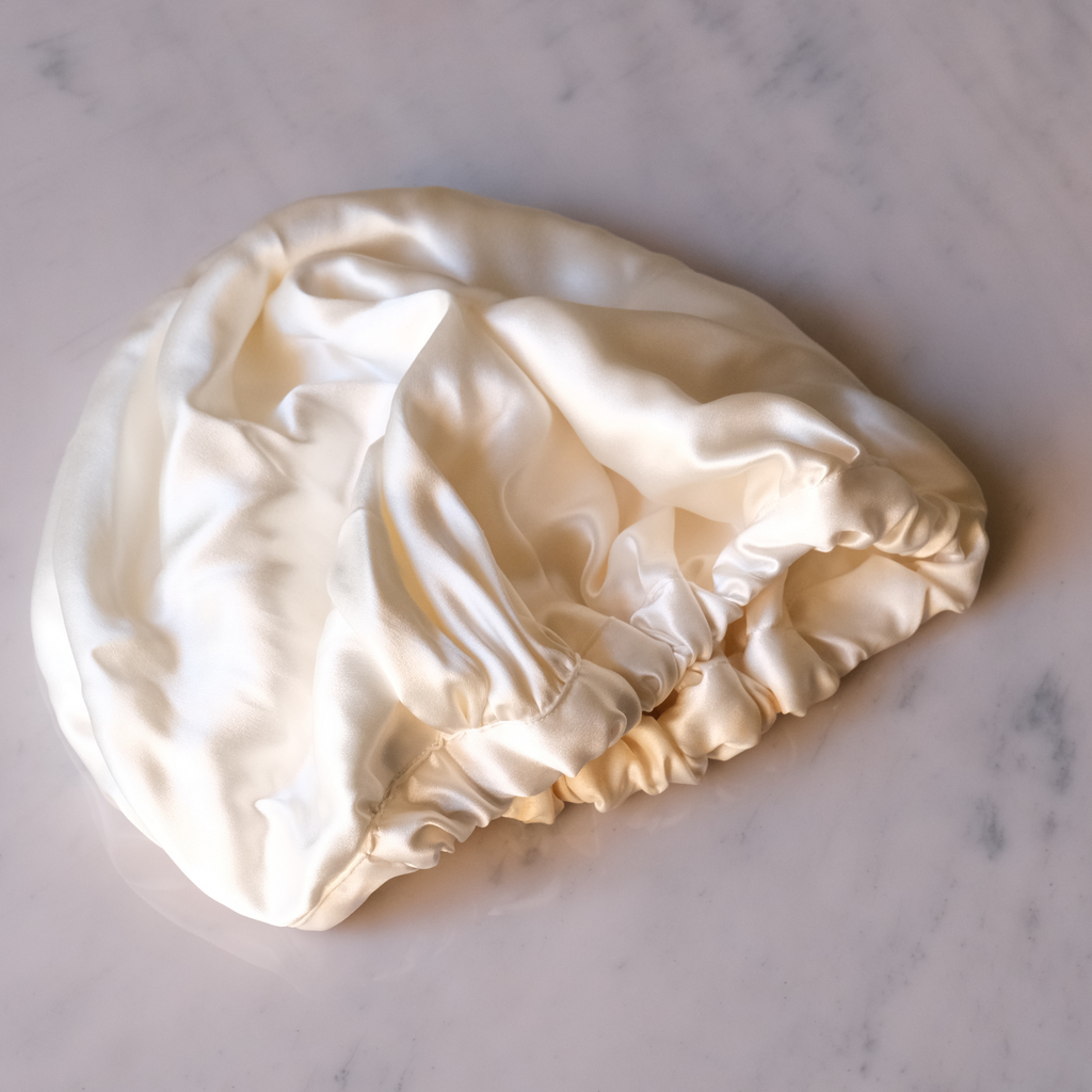  Baby Silk hair Bonnet/cap on a white background used for bald spot protection